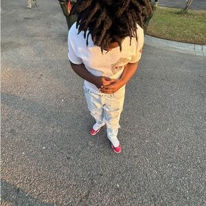 White T-Shirt and Light Blue Distressed Jeans with Red Sneakers made to order